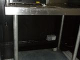 an image of a commercial pizza oven in a kitchen