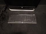 an image of a desktop computer with a keyboard and mouse
