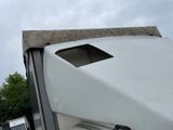 an image of a truck that has been flipped over