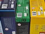a lot of different colored boxes stacked on top of each other