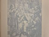 an old book with a picture of a group of people
