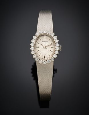 une montre-bracelet pour femme sertie de diamants, signée Cartier