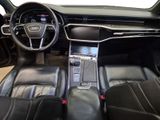 the interior of a car with black leather seats and a steering wheel