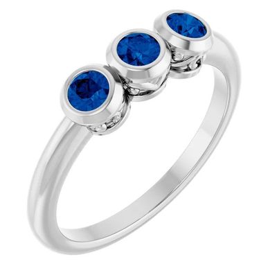 bague à trois pierres avec des saphirs bleus, en argent sterling