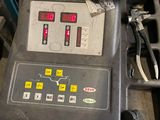 an image of a machine that is sitting in a garage