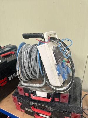 a stack of tools on a table in a room