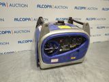 a blue and silver portable generator sitting on top of a floor