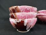 three bowls that are sitting next to each other on a table