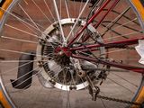 a close up view of a bicycle ' s front wheel