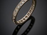 a close up of a wedding ring with roman numerals on it