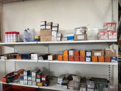 many items on the shelves in the garage