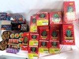 many boxes of candy on a table with a white table cloth