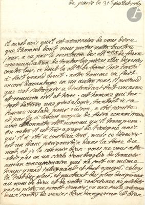 lettre manuscrite écrite à l'encre noire sur une feuille de papier