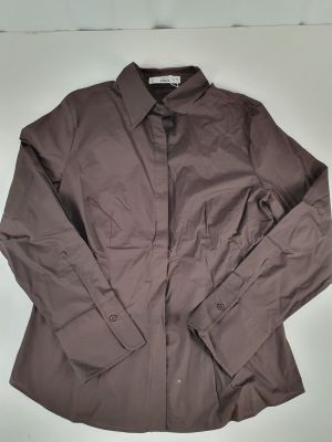 the shirt is brown and has a button down collar