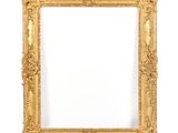 a gold frame with a white background and a white wall