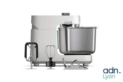 a blender that is sitting next to a mixer