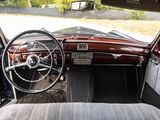 a view of the inside of a car from the driver ' s seat