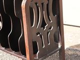 a wooden table with a wine rack on it