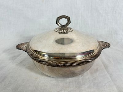 an antique silver plate covered casserole with a lid