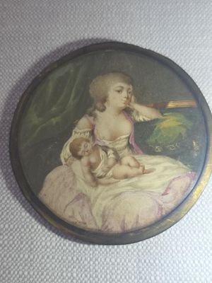 painting of a woman holding a baby in her lap
