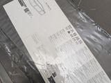 a piece of plastic on a table with a piece of paper on it