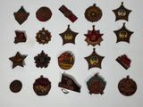 a lot of badges that are on the wall