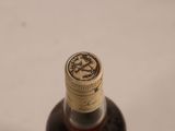 a bottle of liquor that is sitting on a table
