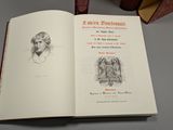 an open book with a drawing of a man on it