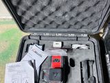 a case with tools in it sitting on the ground