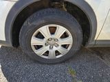 a close up of a tire on a car
