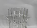 a glass vase that is sitting on a table