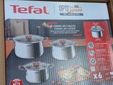 a box that has a set of pots and pans in it