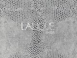 a close up view of a snake skin texture