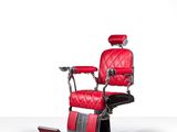 an image of a red barber chair on a white background