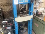 an image of a machine that is sitting in a garage
