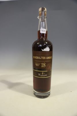 an image of a bottle of whiskey sitting on top of a table