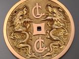 une image représentant une pièce d'or sur laquelle figure la lettre « e »