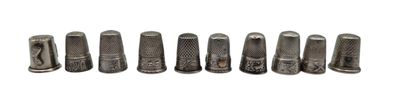 six different sizes of screws in a row on a white background
