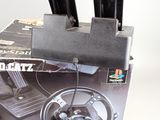 a box with a game controller and a game controller in it