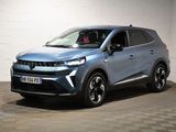 un 4x4 bleu garé dans un garage au sol en damier
