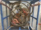 a metal cage with a bunch of tools inside of it