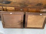 two wooden boxes that are sitting next to each other