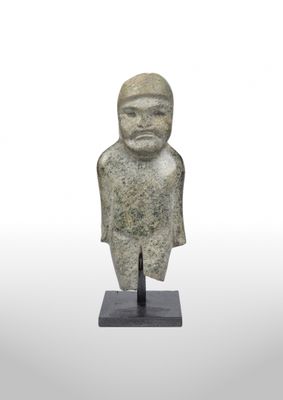 a close up of a statue of a man with a beard