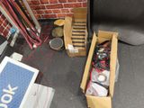 a box of tape and a pair of scissors on the floor