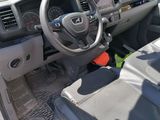 the interior of a car with a steering wheel, dashboard, and dash board