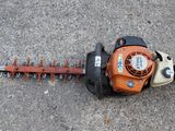 an image of a hedger that is laying on the ground