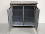 an antique brass and glass display cabinet with two doors