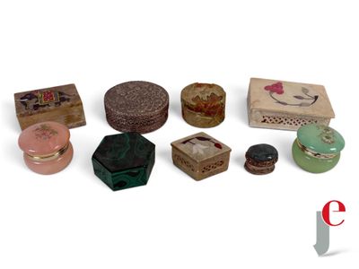 many different types of boxes and containers on a white surface