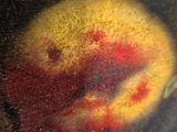a close up of a painting of fruit on a table