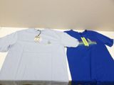 two t - shirts are sitting on a table next to each other